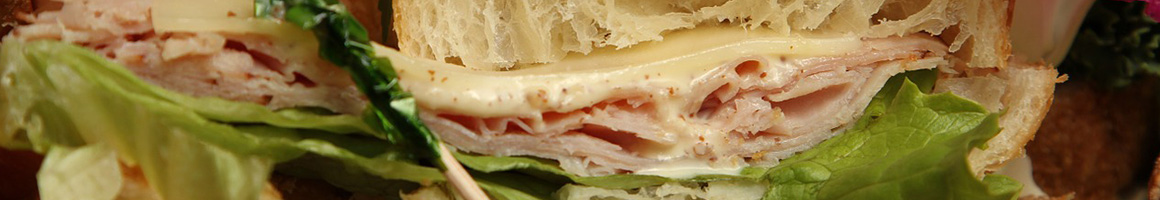 Eating Sandwich at Cam's Ham restaurant in Huntington, WV.
